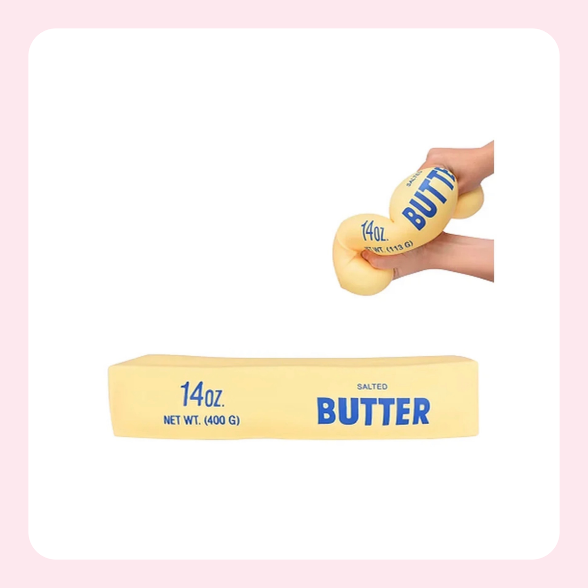 A 14 oz stick of butter shown in its yellow wrapper, with a hand holding two round butter scoops above it on a white background with a light pink border.