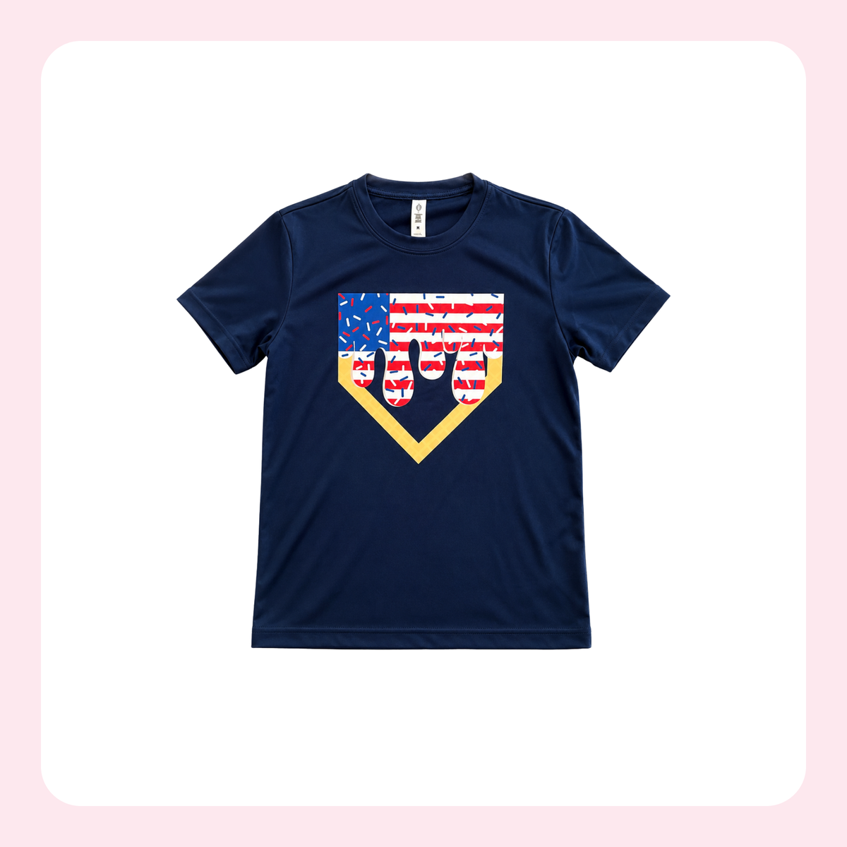 A navy blue short-sleeve t-shirt with a baseball-themed graphic on the chest. The graphic features a home plate outline filled with an American flag pattern (red and white stripes and a blue field with white stars) and a black silhouette of a baseball player in a batting stance.