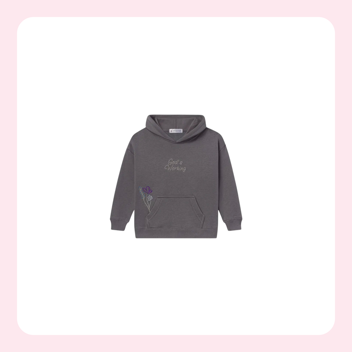 A dark gray pullover hoodie with a kangaroo pocket, featuring a small embroidered purple flower and the words 'Good & Growing' on the chest, displayed against a white rounded square with a light pink border.