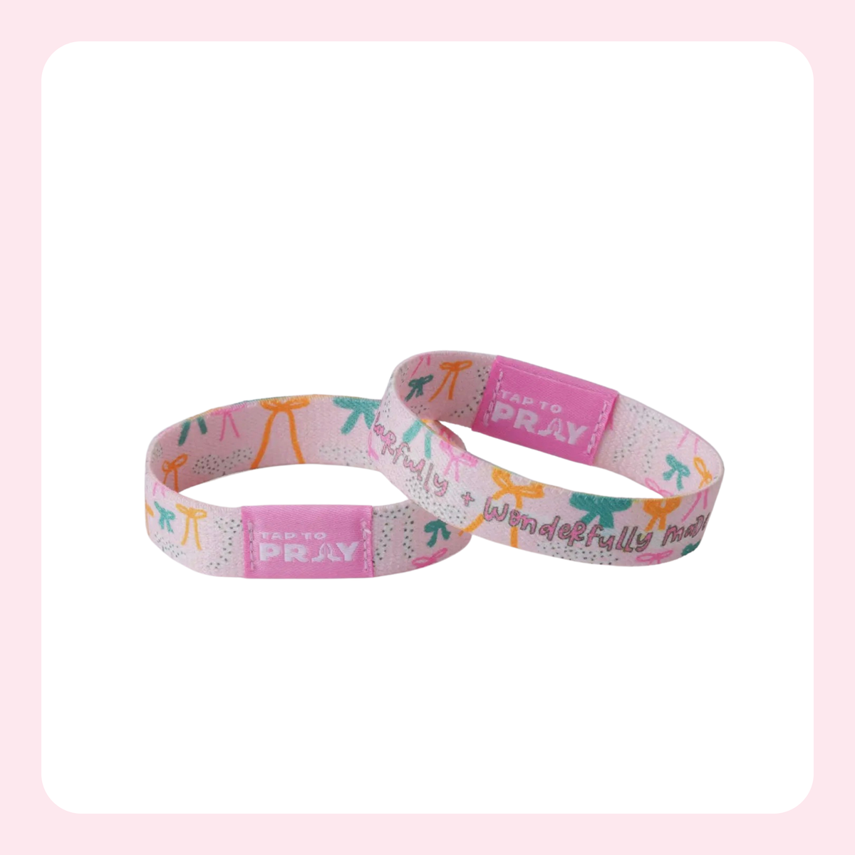 Two pink silicone wristbands with a colorful pattern of chairs and the text 'PRAY TO GOD' and 'pray beautifully', displayed on a white background with a light pink border.