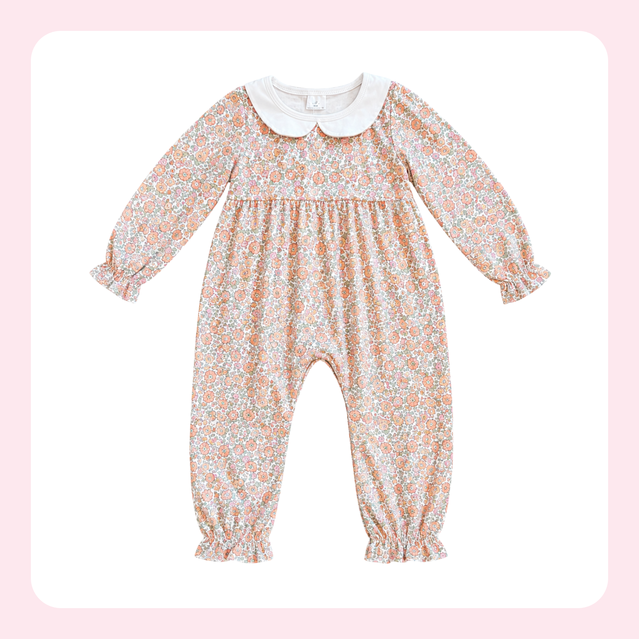 A baby long-sleeve jumpsuit with a dense small floral print in peach, pink, and light blue on a white base, featuring a white Peter Pan collar and elasticized cuffs and ankles.