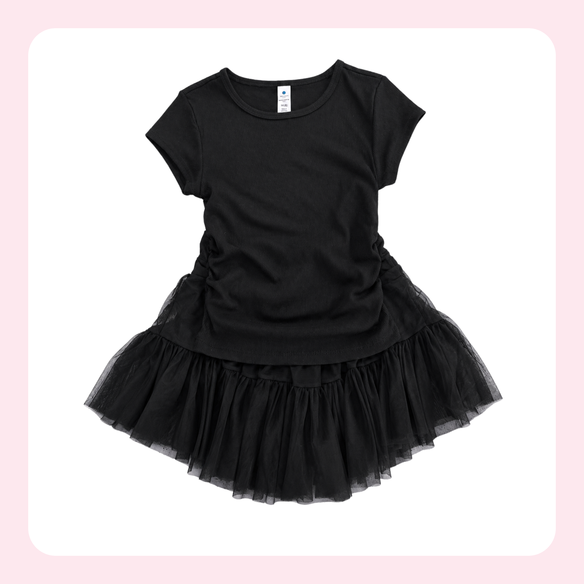 A black short-sleeve baby tee dress with a ruched bodice and a layered black tulle tutu skirt, shown against a white background with a light pink border.
