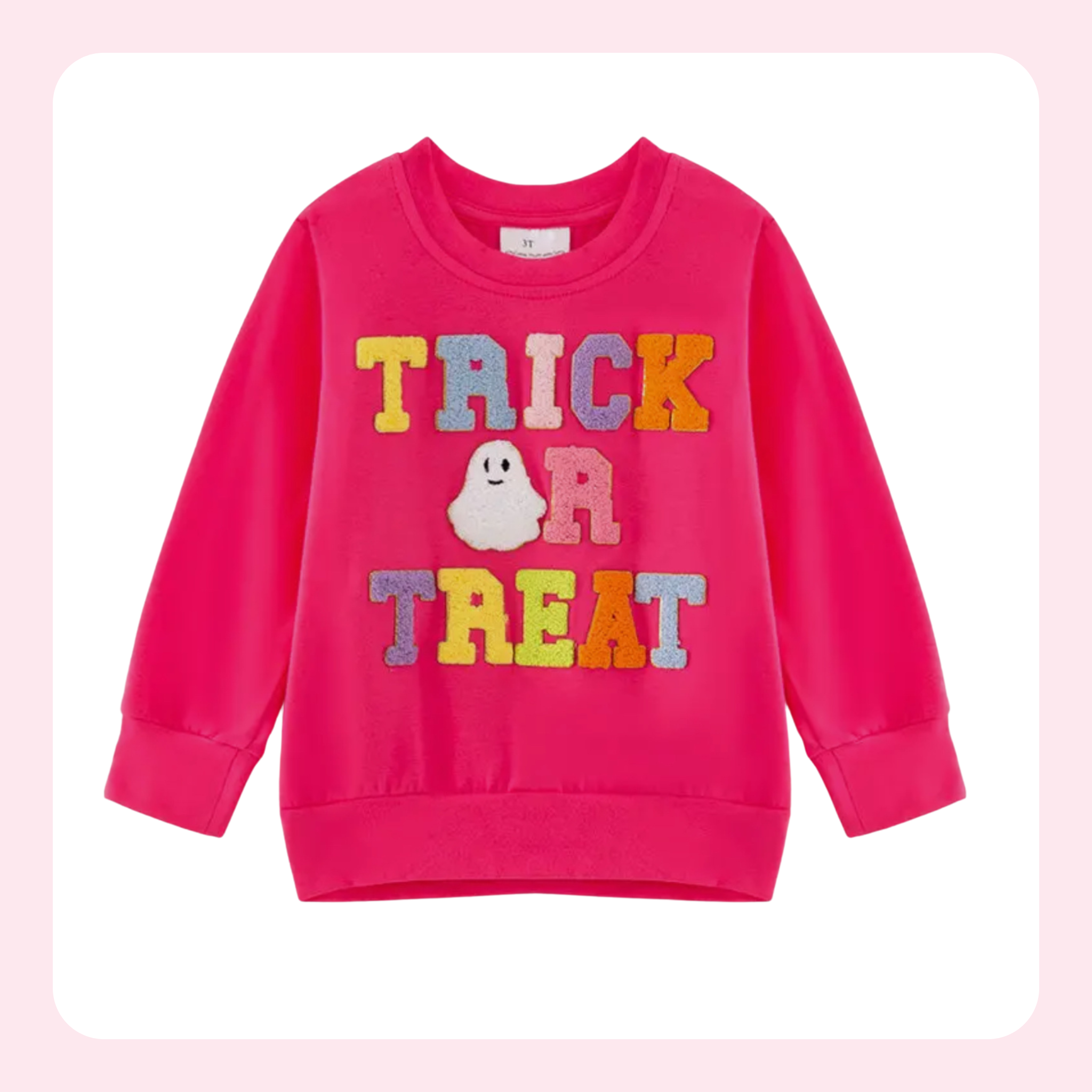 A bright pink long-sleeve sweatshirt with 'TRICK OR TREAT' and a ghost applique on the front, displayed on a white background with a soft pink border.
